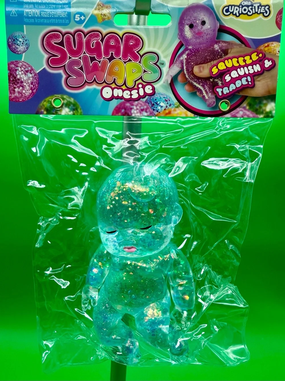 Sugar Swaps Onesie Squeeze Toy - Pink Glitter